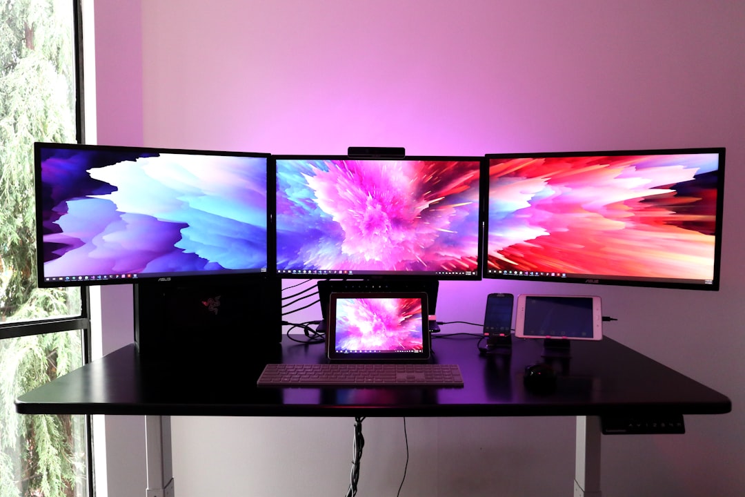 black-flat-screen-tv-on-white-wooden-table-svpwtjxmlzg